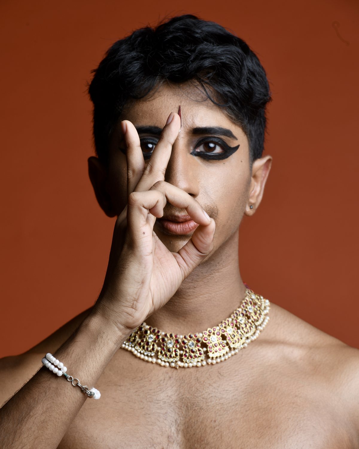 Terracotta portrait with kohl eyes
