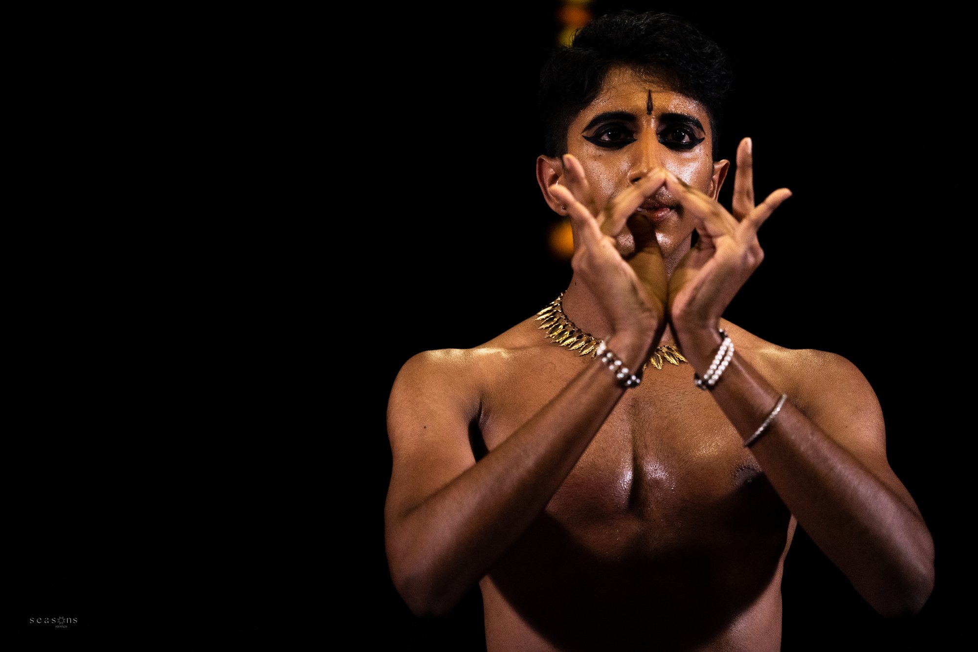 Vivek Ramanan in performance, mudra at the face